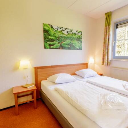 Ein Schlafzimmer in einer Unterkunft im Center Parcs Park Eifel