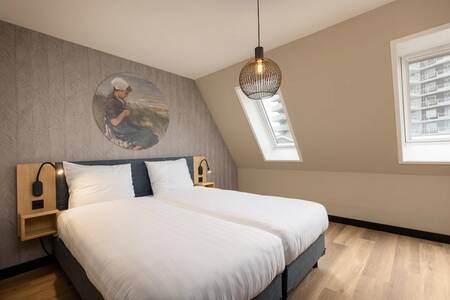 Schlafzimmer in einer Wohnung im Roompot De Graaf van Egmont